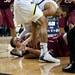 IUPUI Mitchell Patton and Michigan junior Jordan Morgan wrestle for control of the ball on Monday. Daniel Brenner I AnnArbor.com